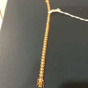 Gold tennis braclet